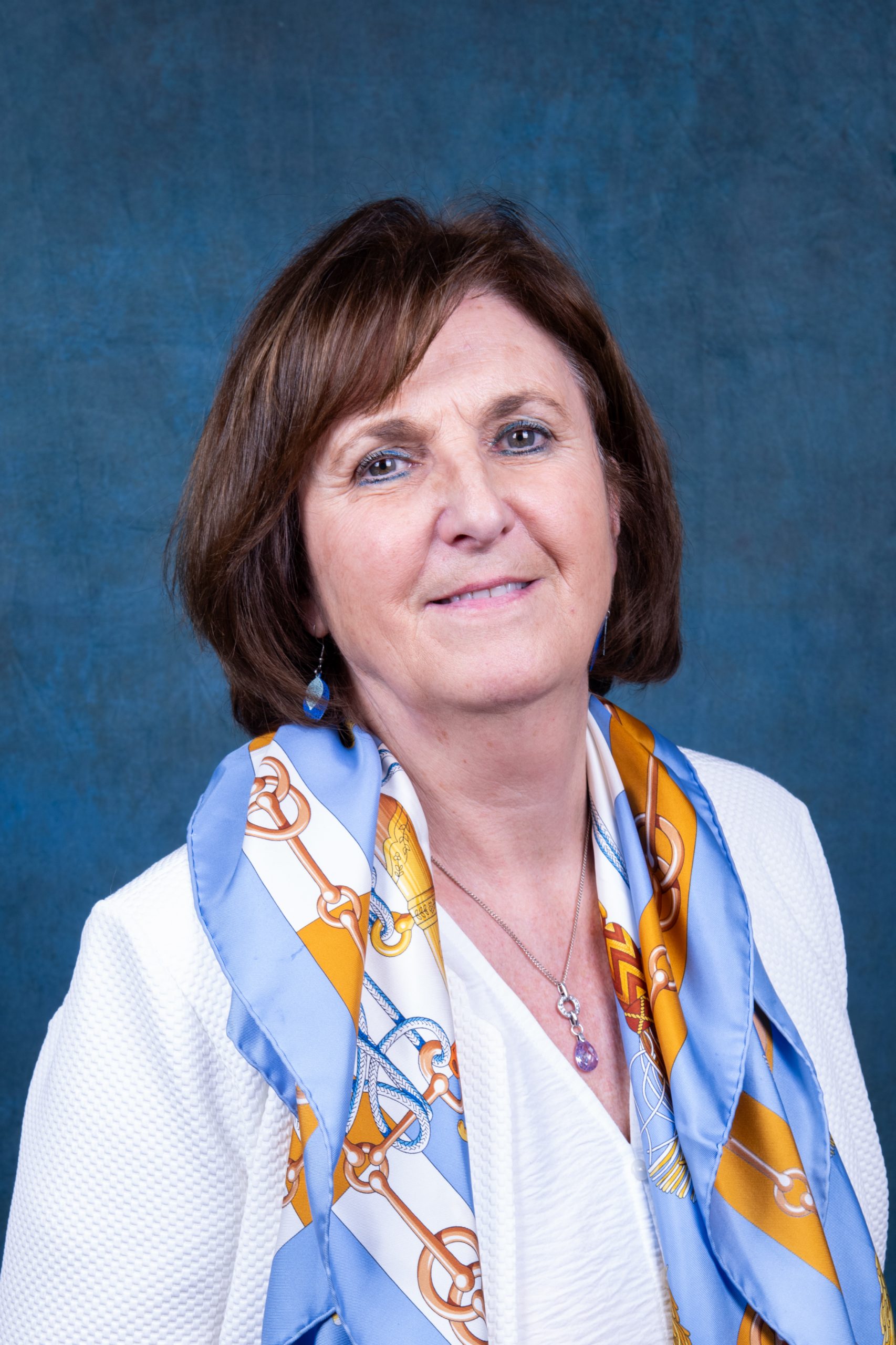 woman with brown hair and black eyes