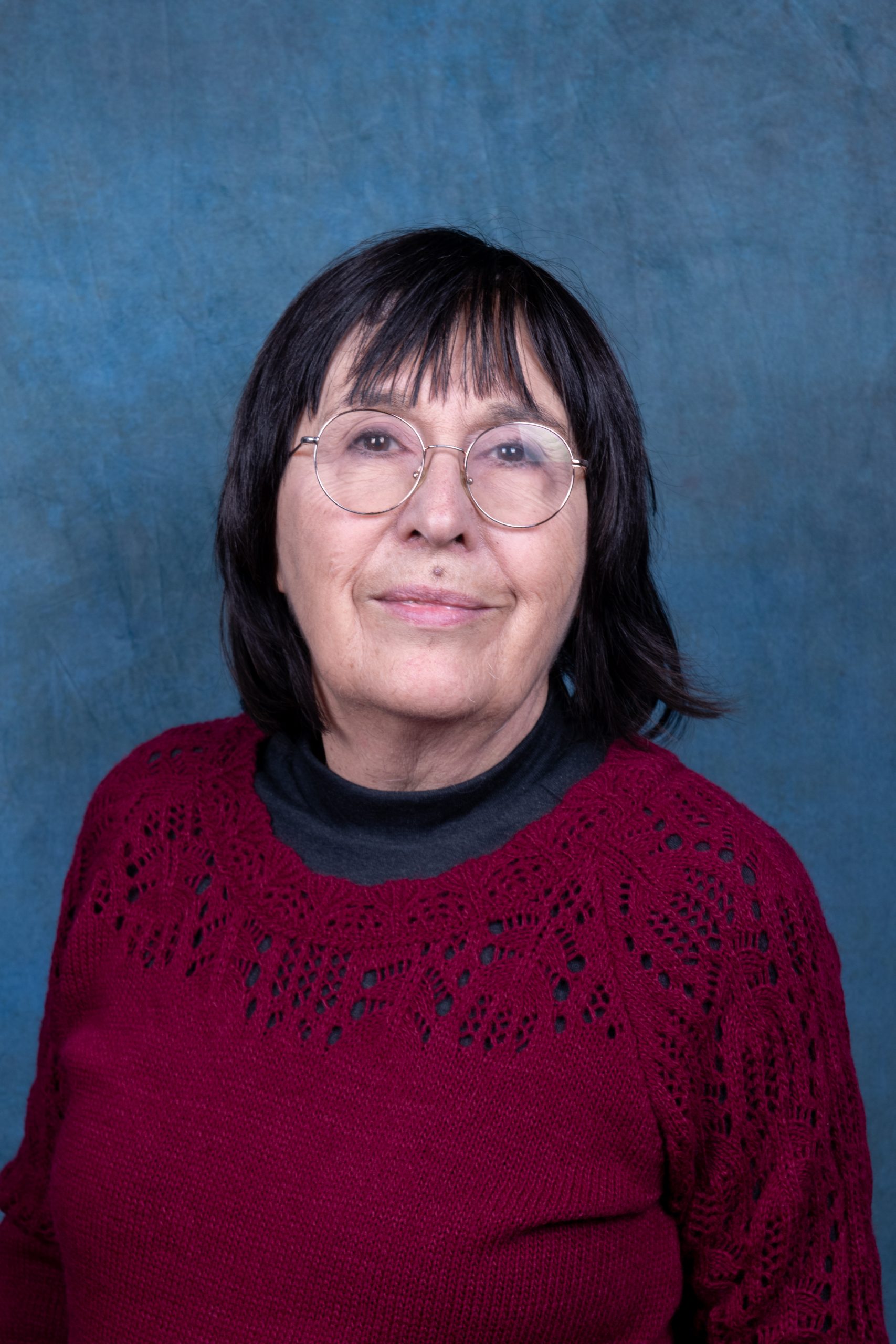 woman with brown hair and black eyes