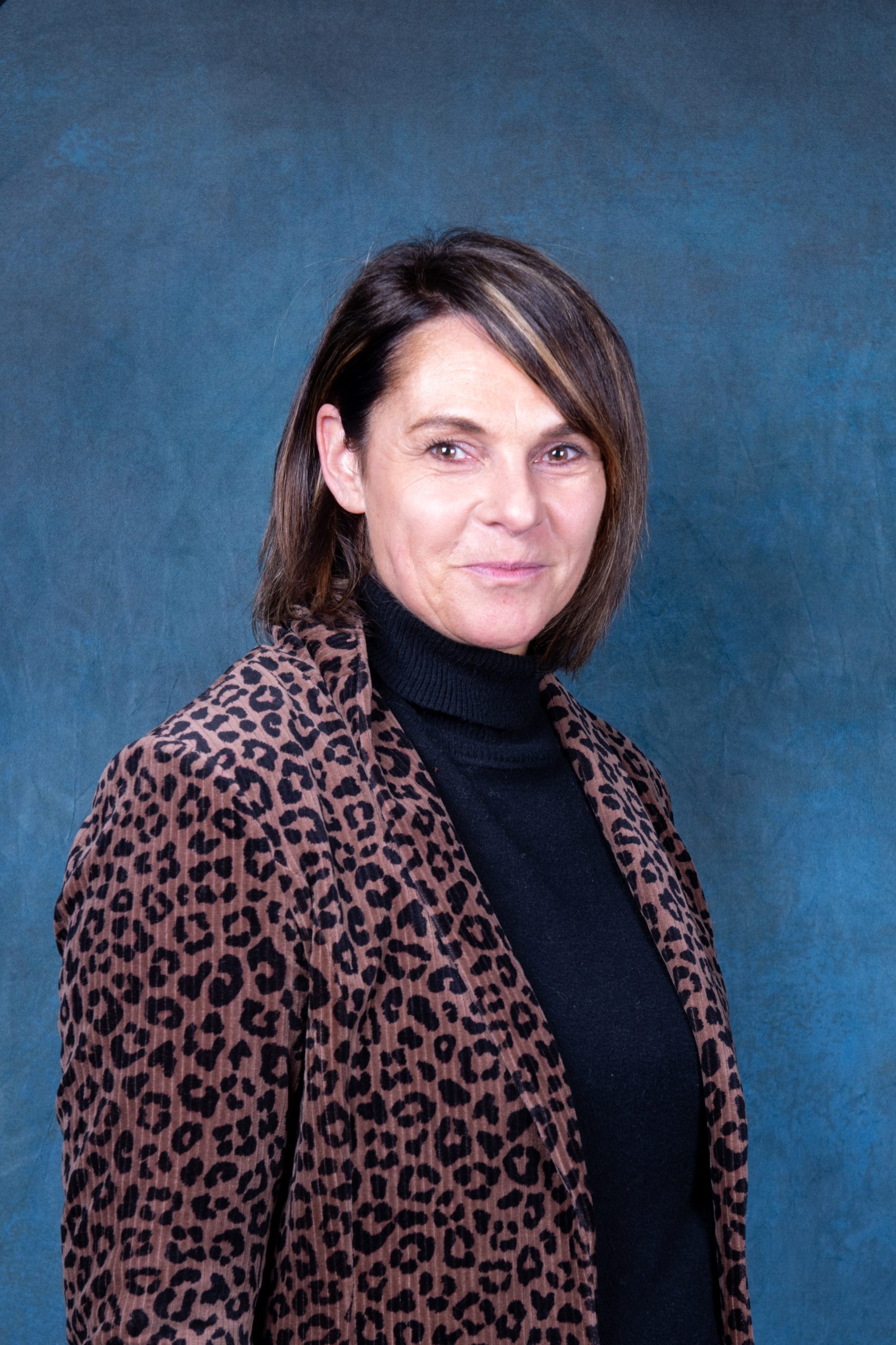 woman with brown hair and black eyes